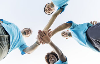 Group of happy and diverse volunteers